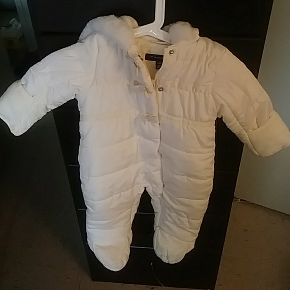 white snowsuit baby girl